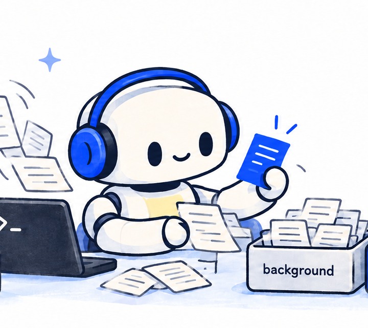 Close-up of Jev smiling while holding a blue signal card at a messy desk of log papers.